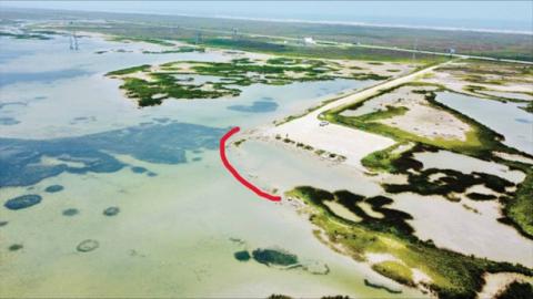 Overhead photo of a shoreline and reef