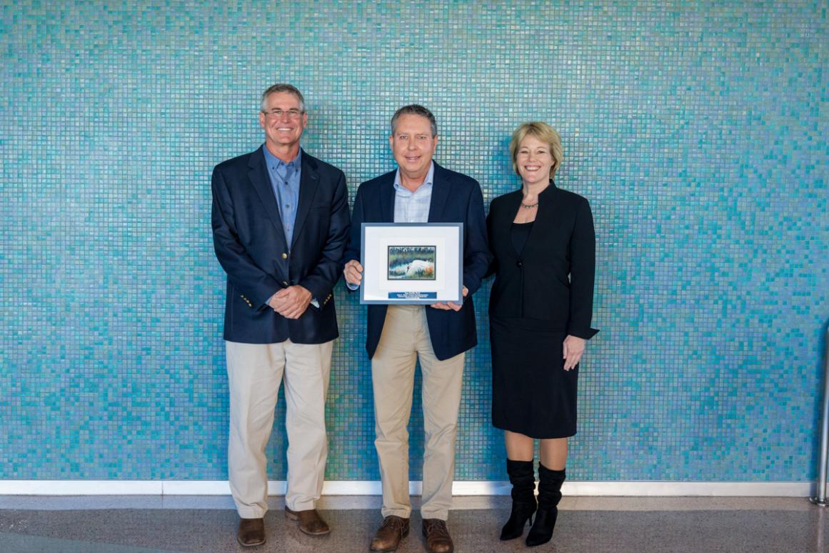 Dr. Gawlik stands with Dr. Greg Stunz and Dr. Kelly M. Miller at endowment luncheon